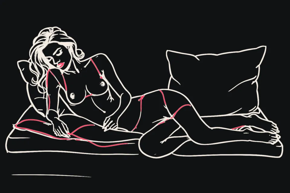 A woman reclines against pillows with her eyes closed